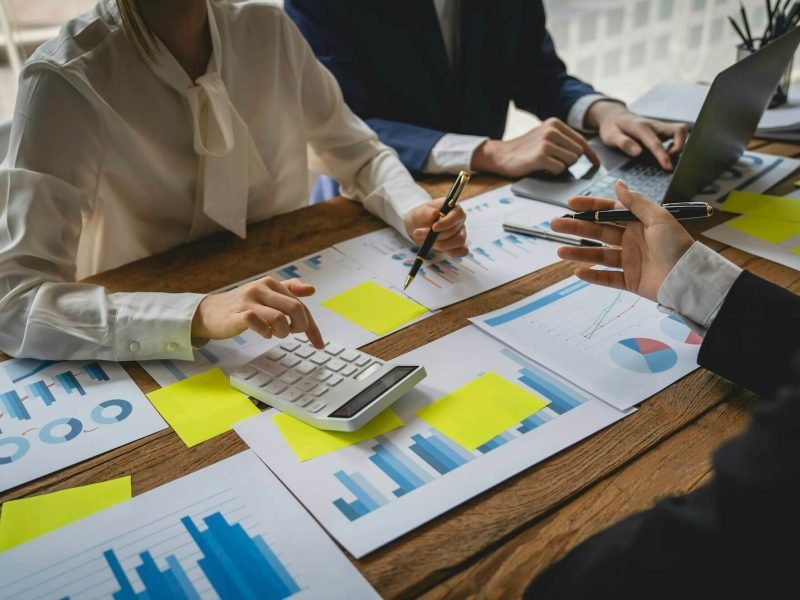 teamwork-with-business-people-consultant-describes-a-marketing-plan-to-set-business-strategies-busi.jpg
